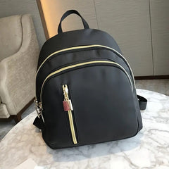 Stylish & Waterproof: Small Solid Color Nylon Backpack for Women - Perfect for Travel, School & Work!